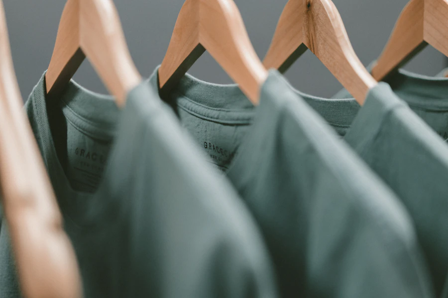 Donated clothes hanging neatly on a rack